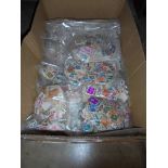 A large lot of bags of loose stamps.