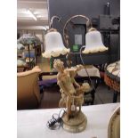 A figural twin light table lamp on marble base, COLLECT ONLY.