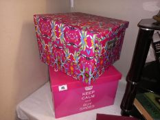 2 decorative collapsible storage boxes