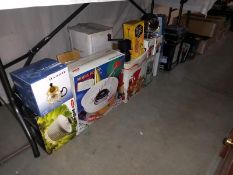 A good selection of boxed kitchen items including food steamer & water dispenser etc.