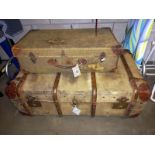 A travel trunk and one other