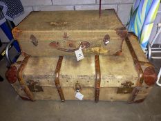 A travel trunk and one other