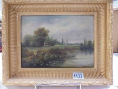 A gilt framed oil on canvas rural scene.