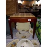 A mahogany dressing table stool