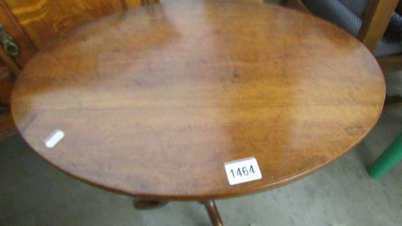 An oval oak occasional table on tripod base with bobbin turned column. COLLECT ONLY. - Image 3 of 3