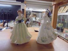 Two Royal Doulton figurines - Pretty Ladies Lily HN5000 and Adele HN2480.