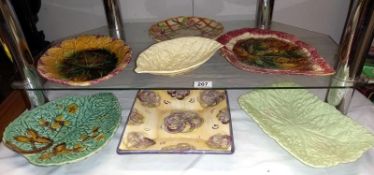 A selection of pottery relief leaf design plates