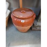A large lidded terracotta pot, 37cm x 41cm high (COLLECT ONLY)