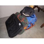 2 laptop bags, a bag and suit holder, plus a bum bag