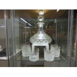 A good quality cut glass ship's decanter with a set of six cut glass whisky goblets. COLLECT ONLY.