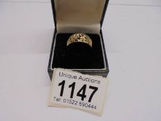A 9ct gold ring, size Q. 2.2 grams.