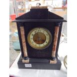 A heavy Victorian black slate Paladian style mantel clock, COLLECT ONLY.