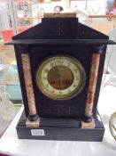 A heavy Victorian black slate Paladian style mantel clock, COLLECT ONLY.