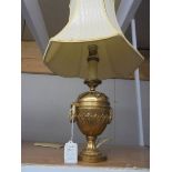 A good quality Adam style brass table lamp with shade.