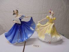 Two Royal Doulton figurines - Elaine HN2791 and Ninette HN2379.