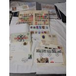 An album of first day covers, stamp album etc.,