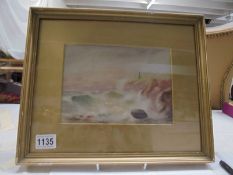 A framed and glazed watercolour seascape signed E Rushworth 1916.