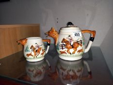 A fox and hounds teapot and milk jug