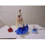 A Royal Doulton figurine Alexandra HN3286, a small Elaine HN2314 and a miniature Elaine and Karen.
