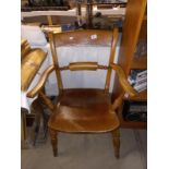 A Victorian oak carver chair