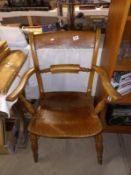 A Victorian oak carver chair