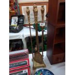 A brass companion set (fire irons/fire tools)