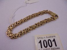 A 9ct gold bracelet, 31.5 grams. (In very good condition)