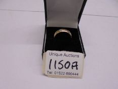 A 9ct gold wedding ring, size R, 3.7 grams.
