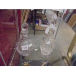 Two good quality cut glass decanters.