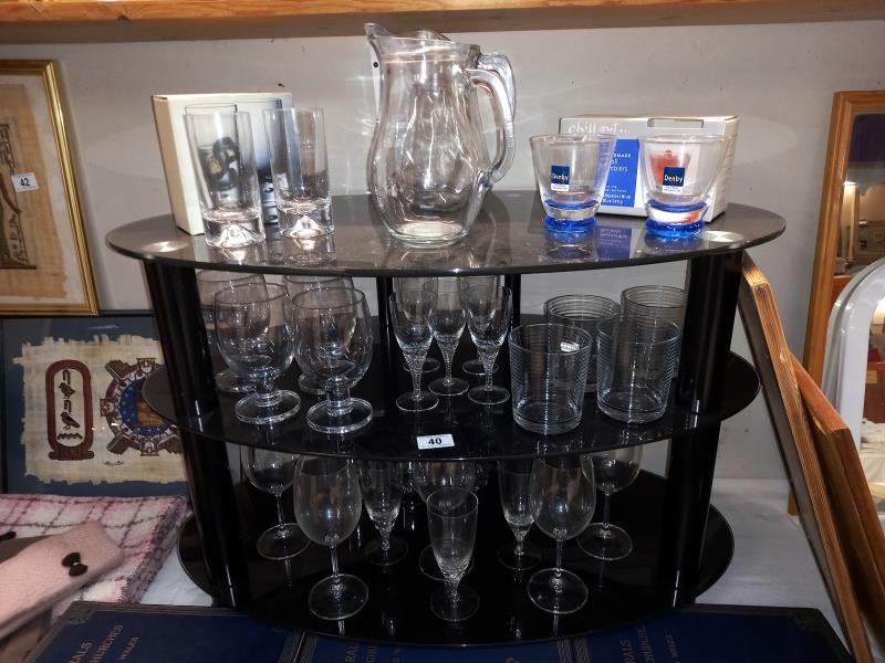 A selection of drinking glasses including Denby Imperial blue tumblers etc