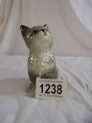 A vintage (1960's) Beswick small seated grey cat looking up Model number 1886.