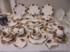 Approximately 68 pieces of Royal Albert Old Country Roses tea and dinner ware, COLLECT ONLY.