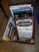 A box of railway related books.