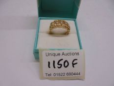 An 18ct gold ring, size S. 4.2 grams.