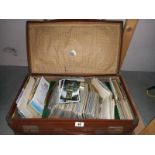 A case full of postcards and guide books etc