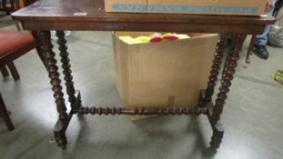 A mahogany side table with bobbin turned legs. COLLECT ONLY.