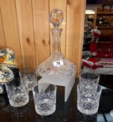 A cut glass decanter and 5 whisky tumblers