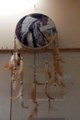 An Indian Chief tambourine/dream catcher with feathers