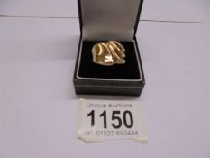 A 9ct gold ring size R, 4.5 grams.