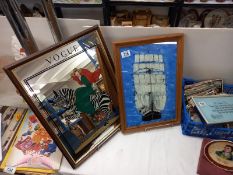A framed Vogue mirror 'Lady on Zebra' and a framed painted sailing ship on glass, COLLECT ONLY.