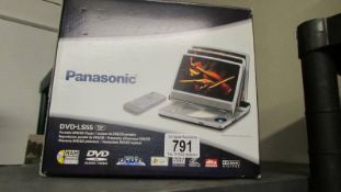 A boxed Panasonic portable DVD player.
