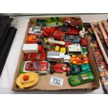 A mixed lot of play worn die cast model vehicles.