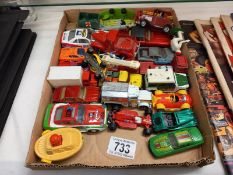 A mixed lot of play worn die cast model vehicles.