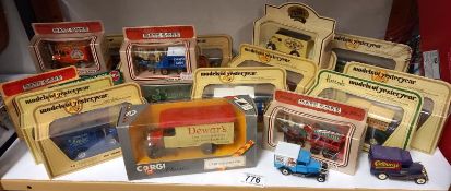 A mixed lot of boxed die cast models.