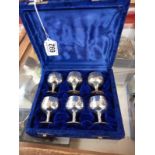 A cased set of six silver plate goblets.