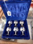 A cased set of six silver plate goblets.