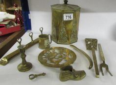 A mixed lot of brass ware including tea caddy.