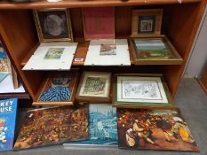 A quantity of framed and unframed pictures.