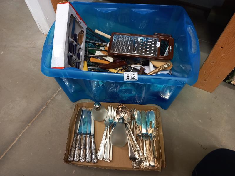 A large lot of cutlery and kitchen utensils.