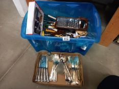 A large lot of cutlery and kitchen utensils.